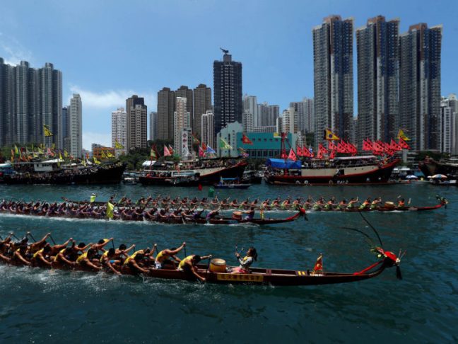 Dragon boats compete during the annual Tuen Ng or Dragon Boat Festival at Hong Kong's Aberdeen
