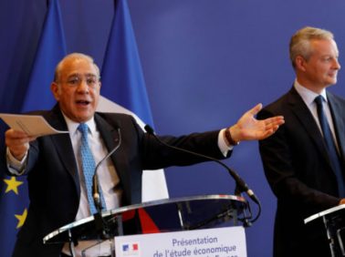 French Finance Minister Bruno Le Maire and Angel Gurria, Secretary-General of the Organisation for Economic Cooperation and Development, attend a news conference on a report on French economy at the Bercy Finance ministry in Paris